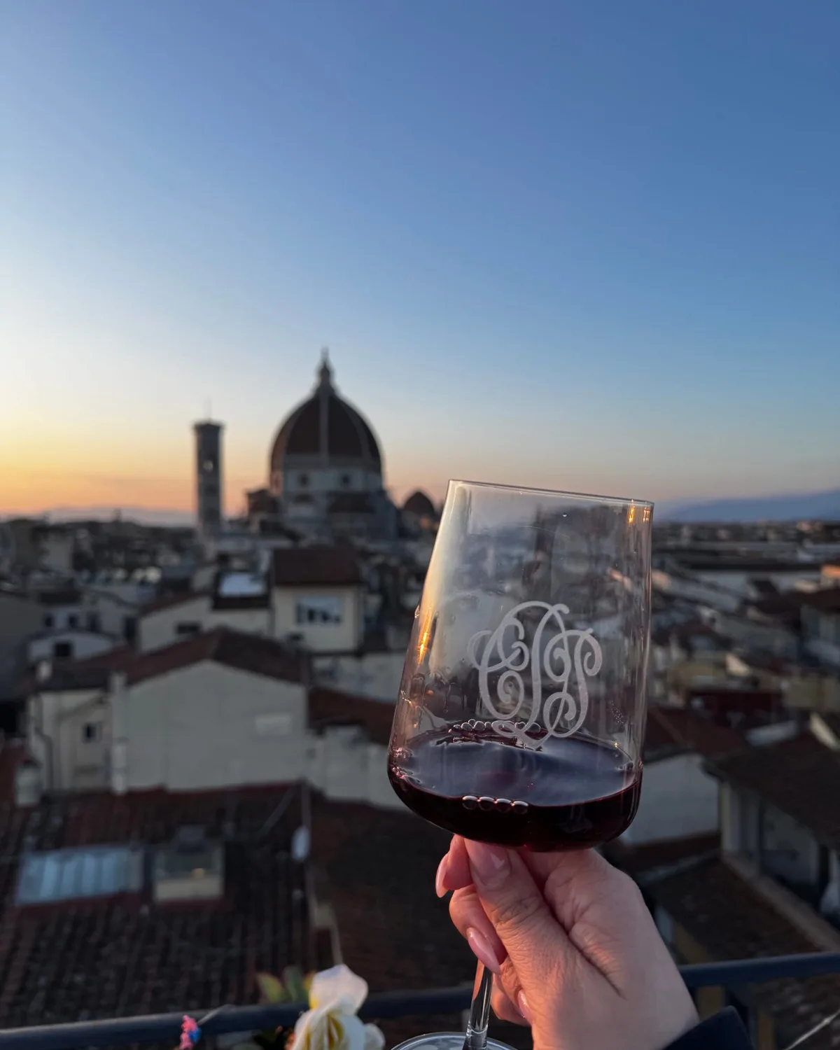 Wine glass against the Florence sunset