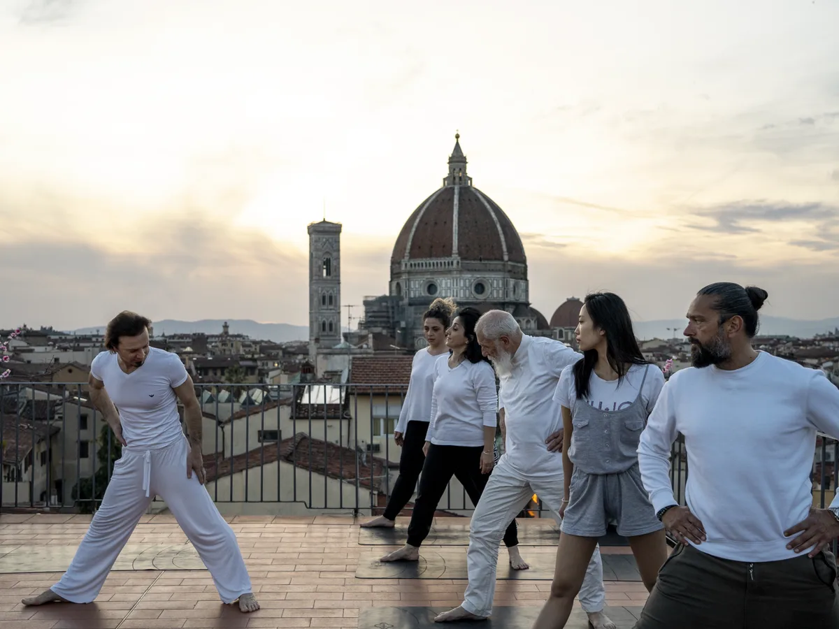 A small yoga class on the panoramic rooftop
